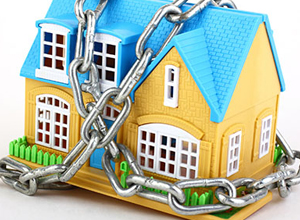 house locked up in chains - irs tax liens