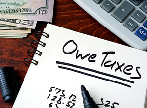 owe taxes calculator with money - back taxes