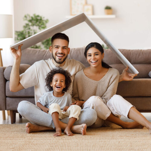 happy family in new home - state income taxes