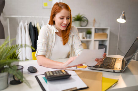 small business owner working on the general business credit and her taxes
