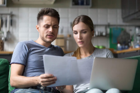 couple stressing about unfiled tax returns