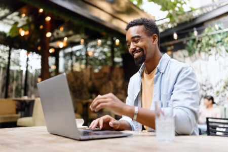 man going online to request tax transcript