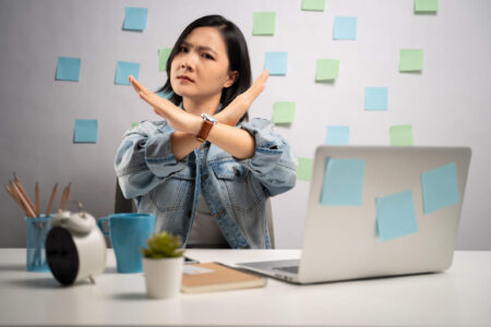 woman warning about employer tax mistakes to avoid