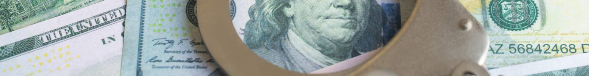 money and handcuffs