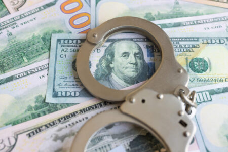 money and handcuffs