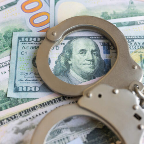 money and handcuffs